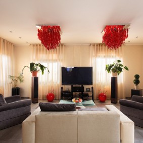Red chandeliers on a flat ceiling