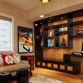 Black wall shelving with wood paneling