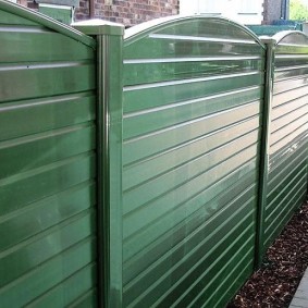 Glossy green fence