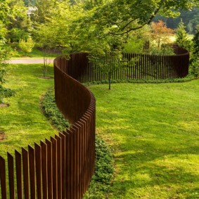 Winding Fence from Wooden Planks