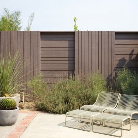 Brown fence made of thin slats