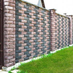 Solid colored brick fence