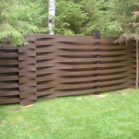 Country wicker fence made of wood