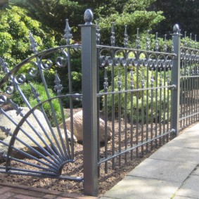 Forged garden fence elements