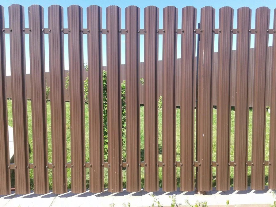 Brown galvanized picket fence