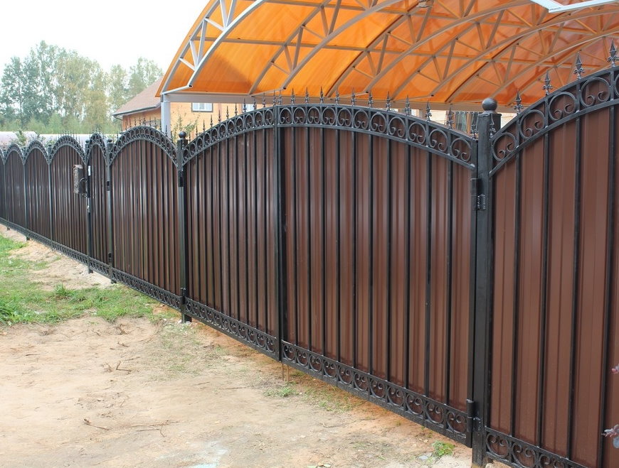 Professional sheet on the forged fence of a suburban area