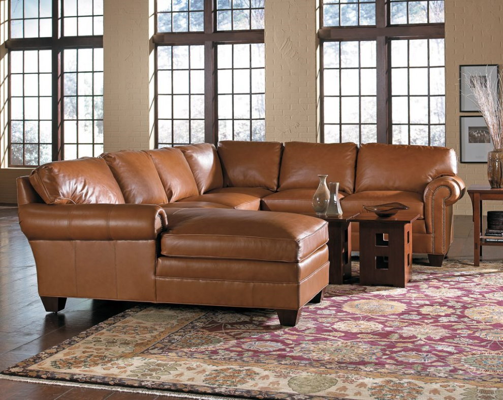 Brown U-shaped leather sofa