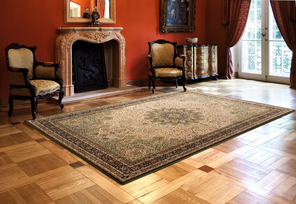 Rectangular carpet on the parquet floor in the hall