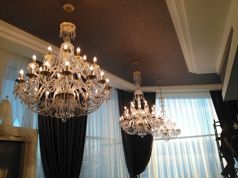 Crystal chandeliers on the ceiling of the hall