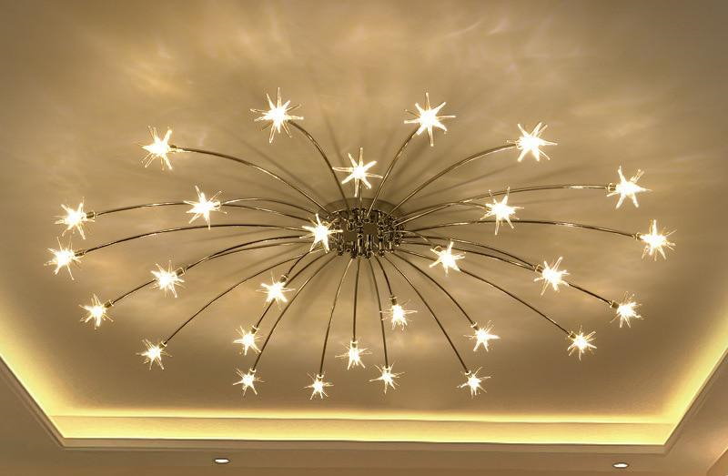 LED chandelier on a stretch ceiling in the hall