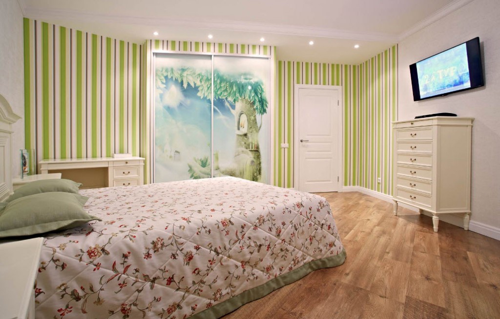 Striped wallpaper in the nursery for a teenage girl