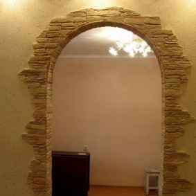 stone arch in the apartment interior photo