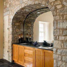 stone arch in apartment design photo