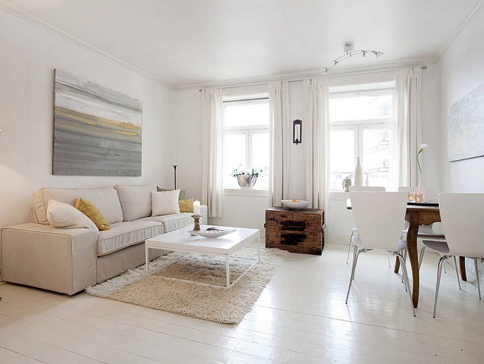 Design vardagsrum med vitt golv