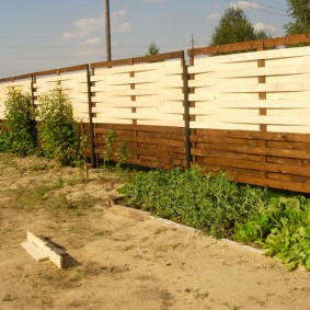 wooden fence for plot design photo