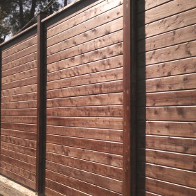 wooden fence for the plot photo options