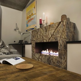 Dekorasyon ng bato ng portal ng fireplace