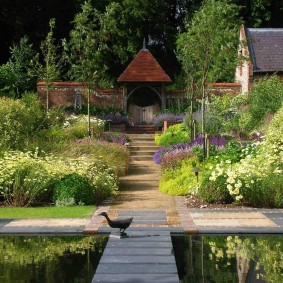 Mixed style garden with artificial pond