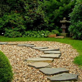 Stone garden path with gravel backfill