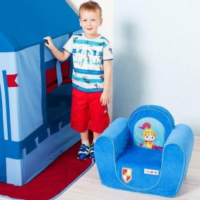 Gaming chair with blue upholstery for a boy