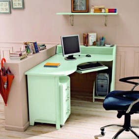 Corner computer desk for a student