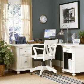 White furniture in a gray room