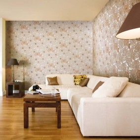 Zoning the living room with paper wallpaper