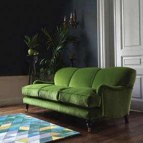 Folding sofa with soft armrests