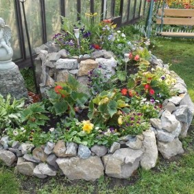 flower bed made of stone decor photo
