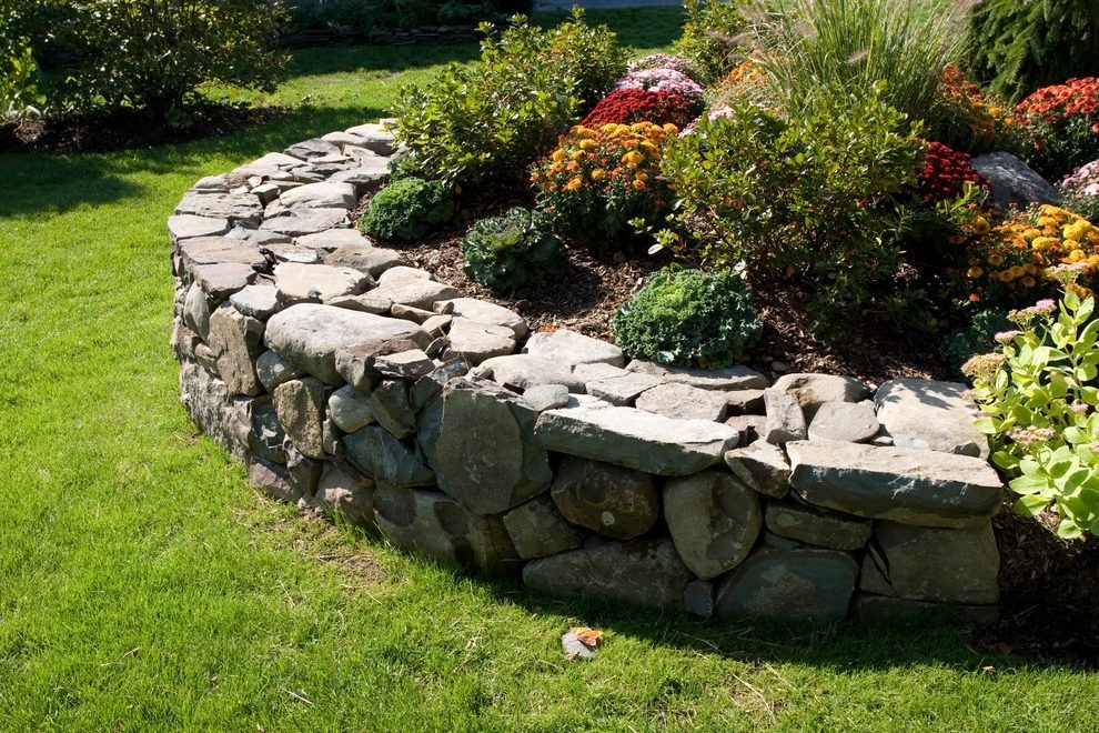flower bed made of stone design photo
