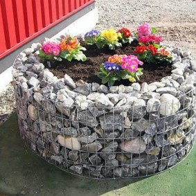 do-it-yourself flower beds made of stones photo ideas