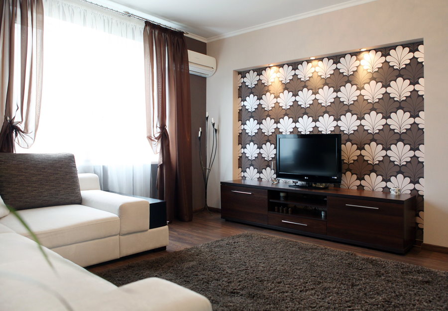 Zoning of a modern room with beautiful wallpaper