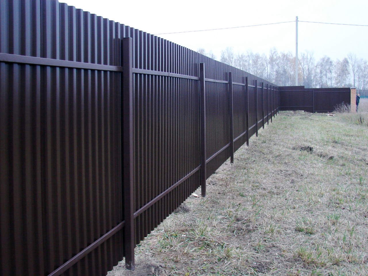 fence from corrugated board photo design