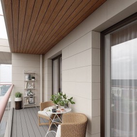 Stylish balcony with wooden floor