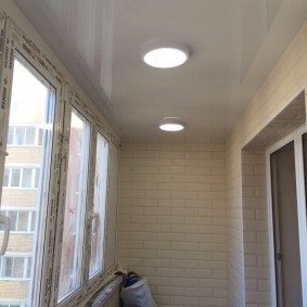 Overhead lights on a plastic ceiling