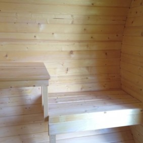 Natural wood benches in the sauna