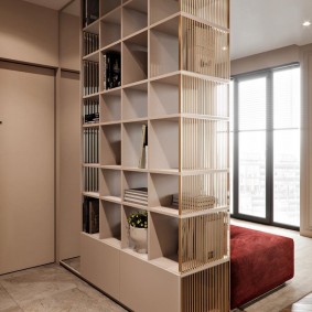 Shelving made of sheet material in the entrance hall of the apartment