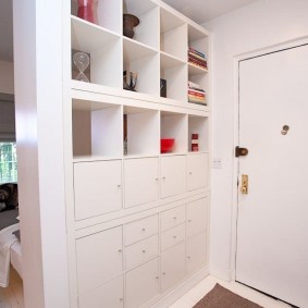 White shelving in the hallway