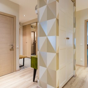 Built-in wardrobe in the center of the spacious entrance hall