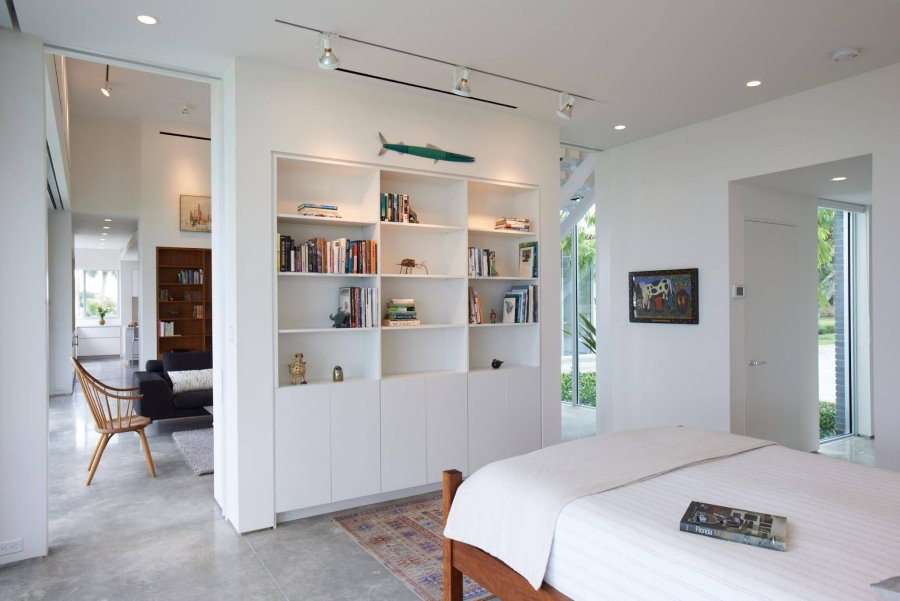White partition with shelves in a private house