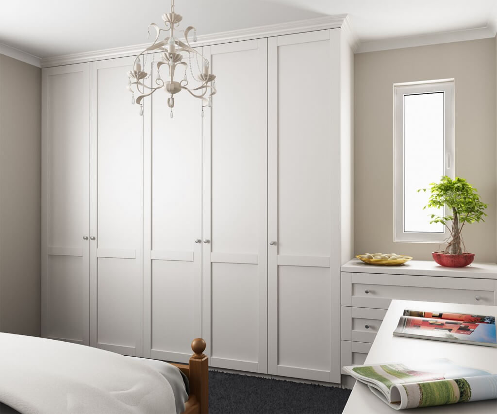 white hinged closet in the hallway
